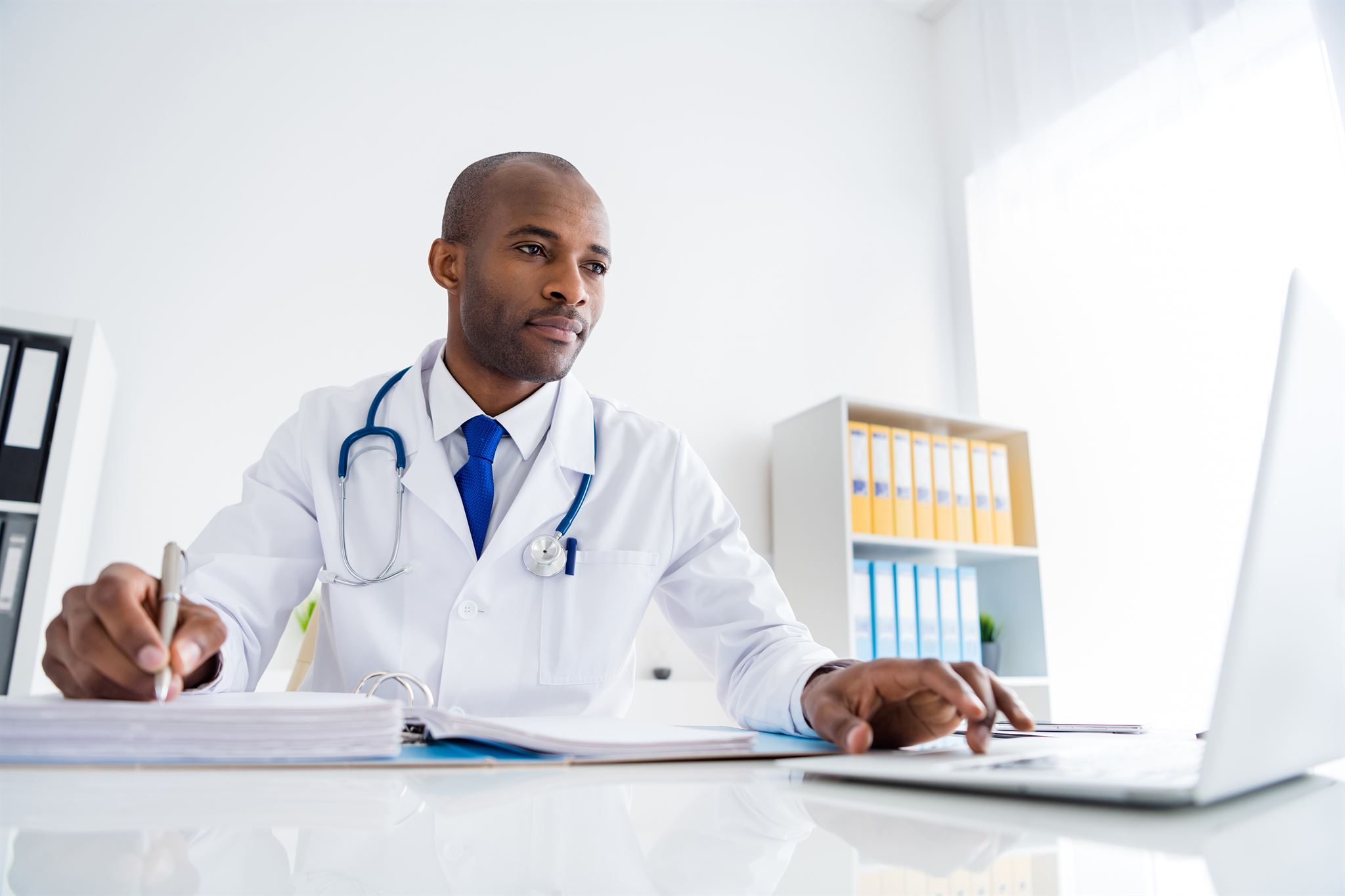 Doctor-working-on-a-laptop